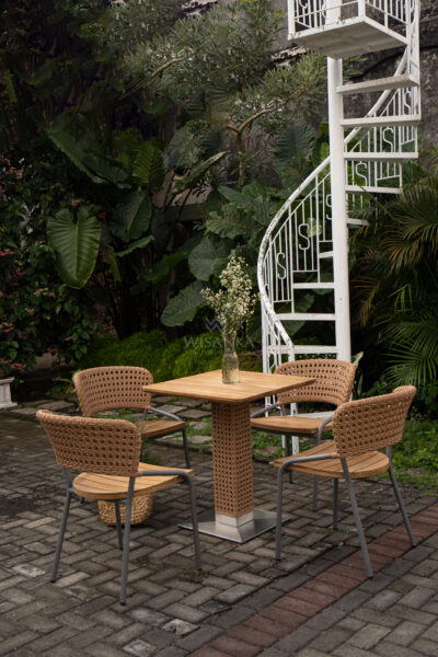 Onega Dining Set with teak wood table and four woven synthetic rattan chairs, featuring aluminium frame and stainless steel base in an outdoor garden setting.